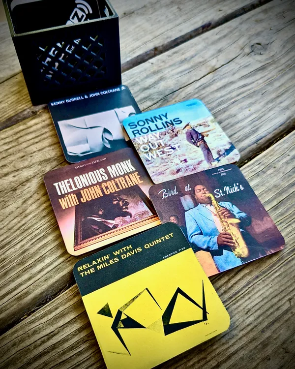 A spread of Concord-style jazz reissue Custom Goodz featuring Sonny Rollins, Thelonious Monk, Bird, and Miles Davis.